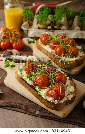 Roasted Cherry Tomato Sauce And Ricotta On Toast