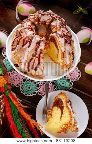 Easter Ring Cake With Icing And Colorful Sprinkles