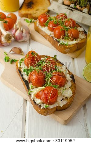 Roasted Cherry Tomato Sauce And Ricotta On Toast