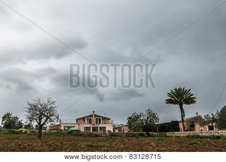 A Rural Finca In Majorca Front View On A Cloudy Day