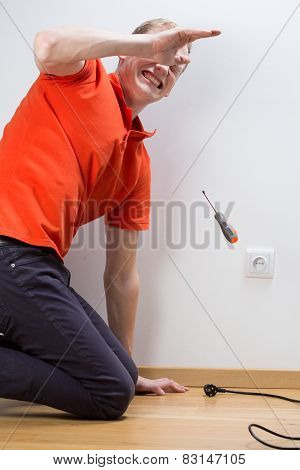 Electrocuted Man Repairing Socket