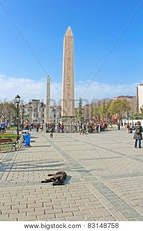ITourists near Obelisk at hippodrome in Istanbul, Turkey