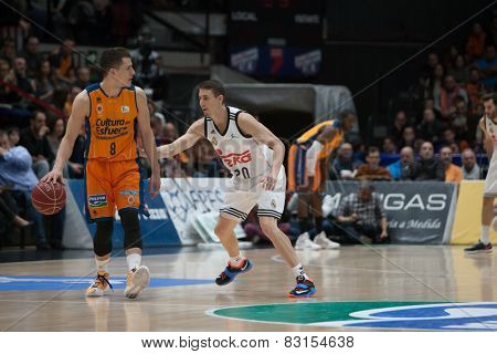 VALENCIA, SPAIN - FEBRUARY 15: Nedovic 8, Carroll during Spanish League match between Valencia Basket Club and Real Madrid at Fonteta Stadium on February 15, 2015 in Valencia, Spain