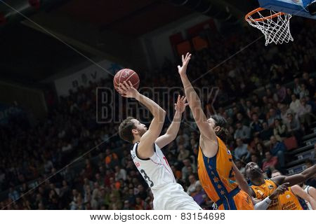 VALENCIA, SPAIN - FEBRUARY 15: Rodriguez with ball and Loncar during Spanish League match between Valencia Basket Club and Real Madrid at Fonteta Stadium on February 15, 2015 in Valencia, Spain