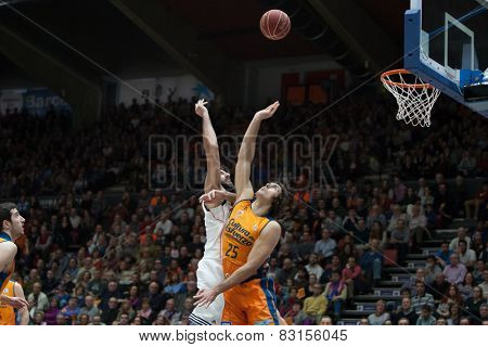 VALENCIA, SPAIN - FEBRUARY 15: Borousis (L), Loncar 25 during Spanish League match between Valencia Basket Club and Real Madrid at Fonteta Stadium on February 15, 2015 in Valencia, Spain
