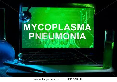Computer with words Mycoplasma pneumonia.