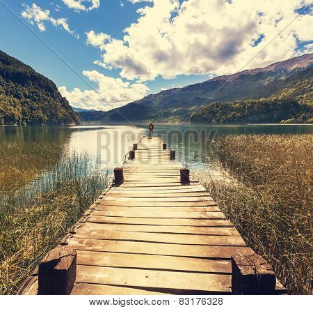 Man on mountains lake