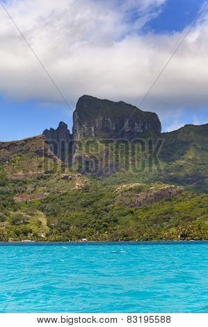 Azure lagoon of island BoraBora Polynesia. Mountains the sea trees.
