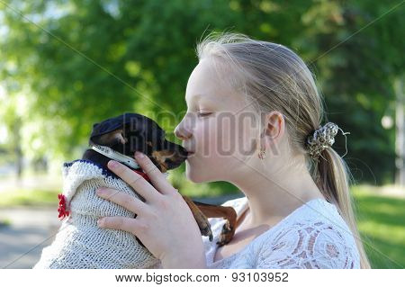 Portrait of a young girl with dog