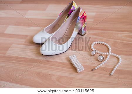 wedding shoes bracelet and earrings, a necklace