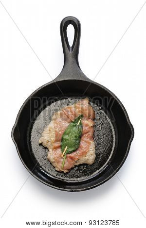 saltimbocca alla romana ( cooked veal, prosciutto and sage ) on skillet