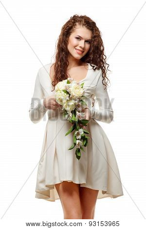 Young Happy Bride In White Short Dress With A Bouquet Of Flowers