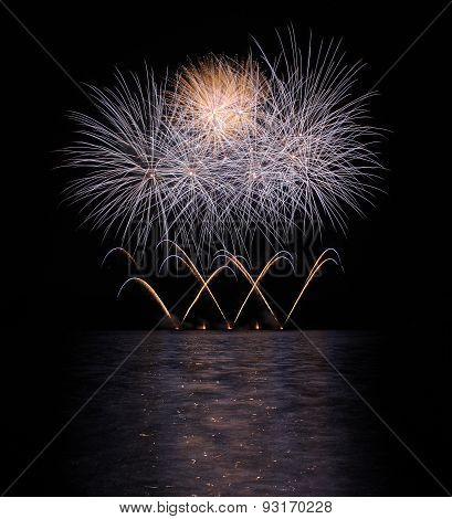 Colorful Fireworks With Reflection On Lake.