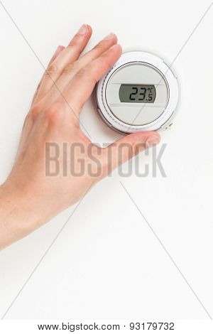 digital climate thermostat controlling by hand