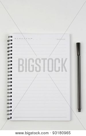 Lank Notebook With Pen On White Background