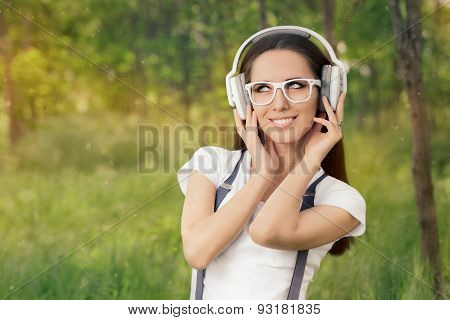 Girl with Headphones Listening to Music