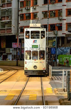 HONG KONG - JUNE 03, 2015: double-decker tram on street of HK. Hong Kong Tramways is a tram system in Hong Kong, being one of the earliest forms of public transport in the metropolis. 