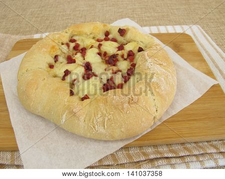 Pizza bread street food with cheese and ham