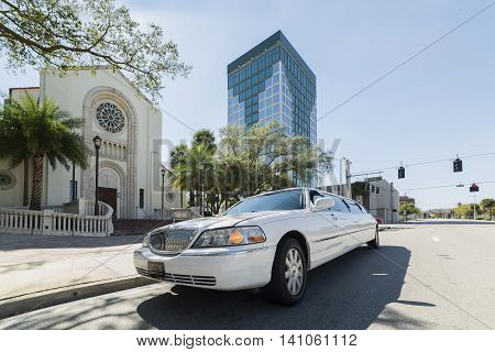 ORLANDO FLORIDA - OCTOBER 25 2014: White limousine Lincoln Town Car before Chateau Dobris