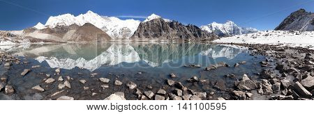 view of mount Cho Oyu mirroring in lake - Cho Oyu base camp - Everest trek - Nepal