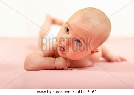 Portrait of adorable baby.Baby lying on his stomach
