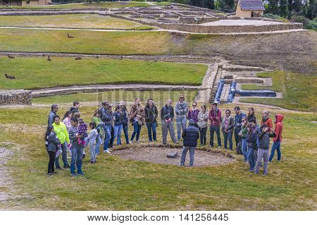 INGAPIRCA, ECUADOR, NOVEMBER - 2015 - Group of tourists at Ingapirca a touristic location in which is located an ancient inca temple located in Azuay province Ecuador