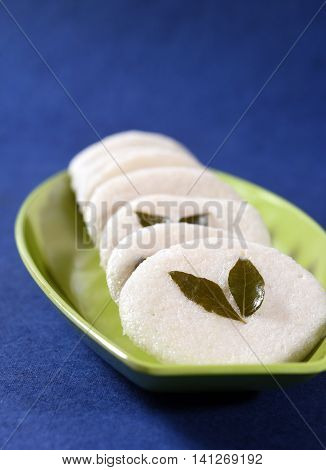 South indian cuisine vegetarian breakfast rava idli or idly in a plate.