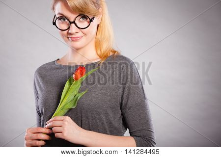 Beauty Woman With Tulip Flower.