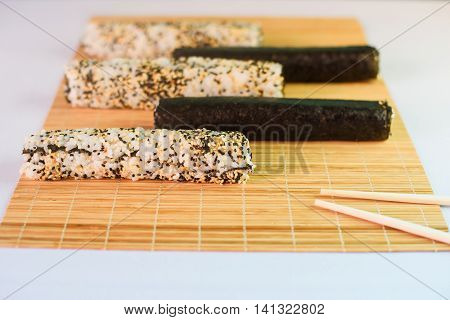 Unsliced Sushi Maki Isolated On White Background