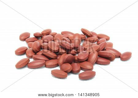 Ferrous Fumarate vitamin capsule on white background