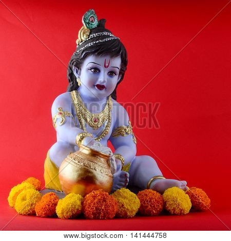 Hindu God Krishna on red background. Greeting Design