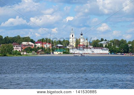 MYSHKIN, RUSSIA - JULY 13, 2016: A view of the downtown of Myshkin from the right Bank of the Volga river, cloud day in july. Historical landmark