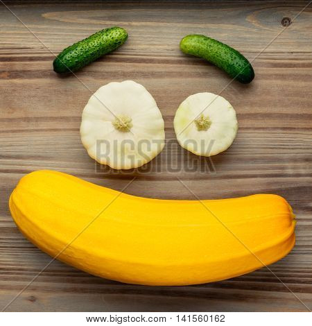 Fresh vegetables on a wooden background. Healthy food.