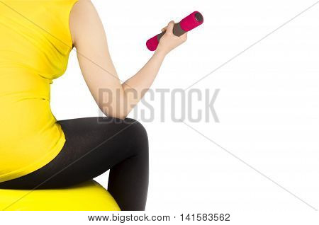 Young woman doing fintess excersises - isolated image