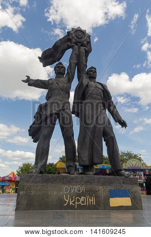 Kiev Ukraine - June 12 2015: Monument depicting workers symbolizing the friendship between the Russian and Ukrainian peoples erected in 1982