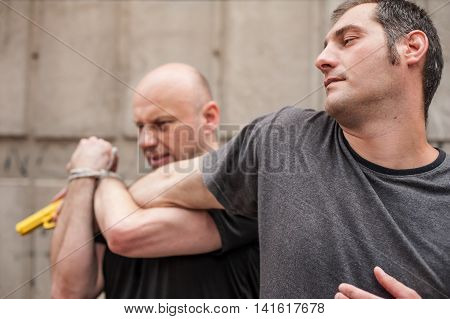 Gun Disarm. Self Defense Techniques Against A Gun Point.
