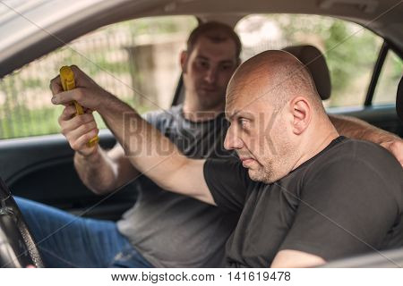 Gun Disarm. Self Defense Techniques Against A Gun Point In The Car.
