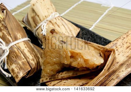 Chinese steamed wrapped in leaves of bamboo