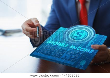 Business, Technology, Internet And Networking Concept. Young Businessman Working On His Tablet In Th