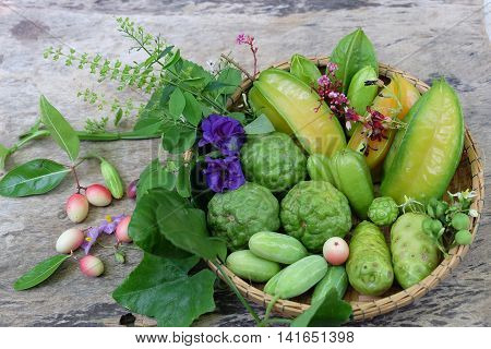 cooking concept, fresh kitchen herbs and spices on wooden table. top view and nature light
