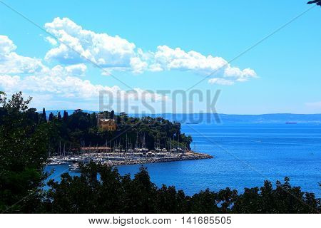 Seaside view in Grignano near Trieste with blue sky sea and lots of yachts