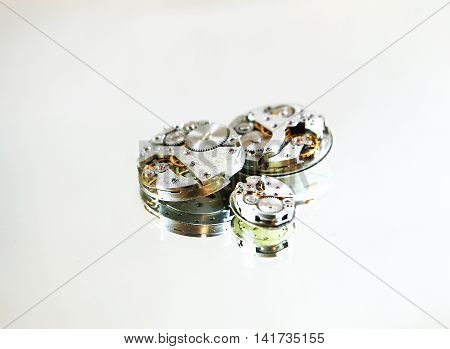 mechanisms and details of different hours on a diverse background photo for micro-stock