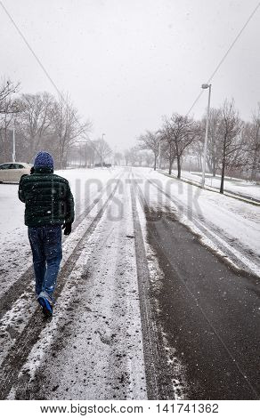 Alone in the Winter Freezing while snowing