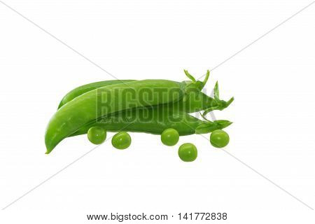 The ripe pods of green peas with peas in a scattering on an isolated background