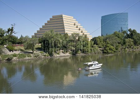 Ziggurat building glass tower building and Sacramento river California.