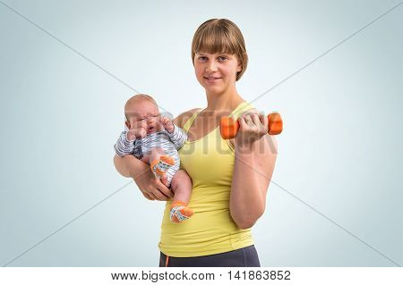 Woman Strengthens With Dumbbell After Childbirth