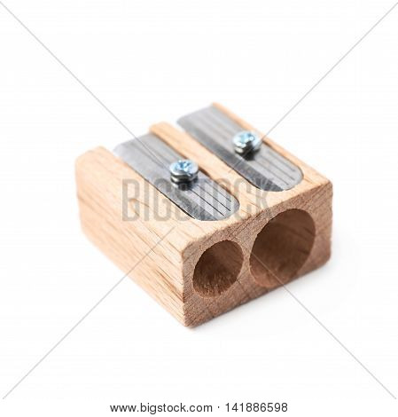 Wooden pencil sharpener isolated over the white background