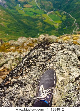 Tourist Feet On Mountain Top