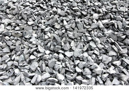 Background of grey beach stone pebbles for texture