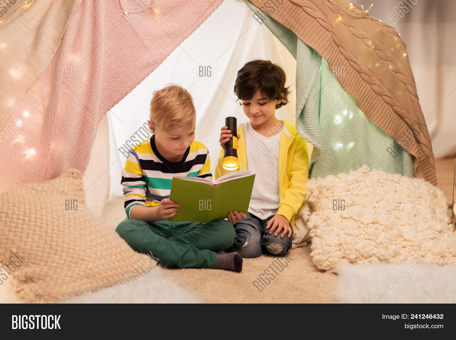 boys reading light